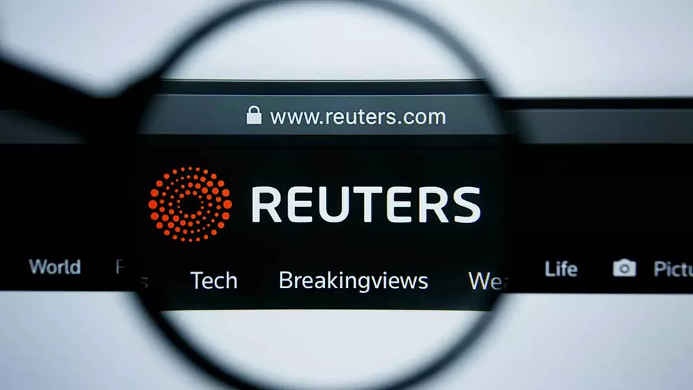 CEO burzy Binance ostro zareagoval na agentúru Reuters