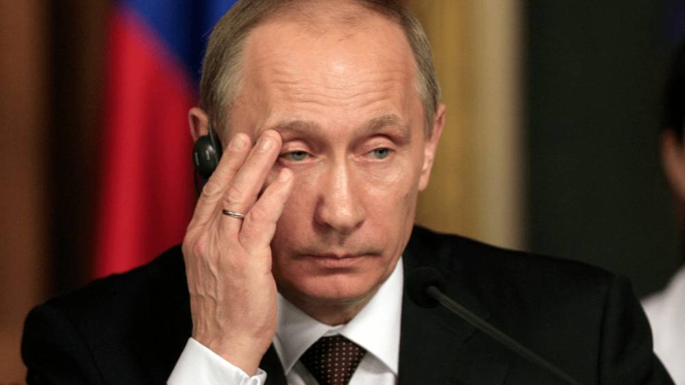 Vladimír Putin predpovedá pád amerického dolára