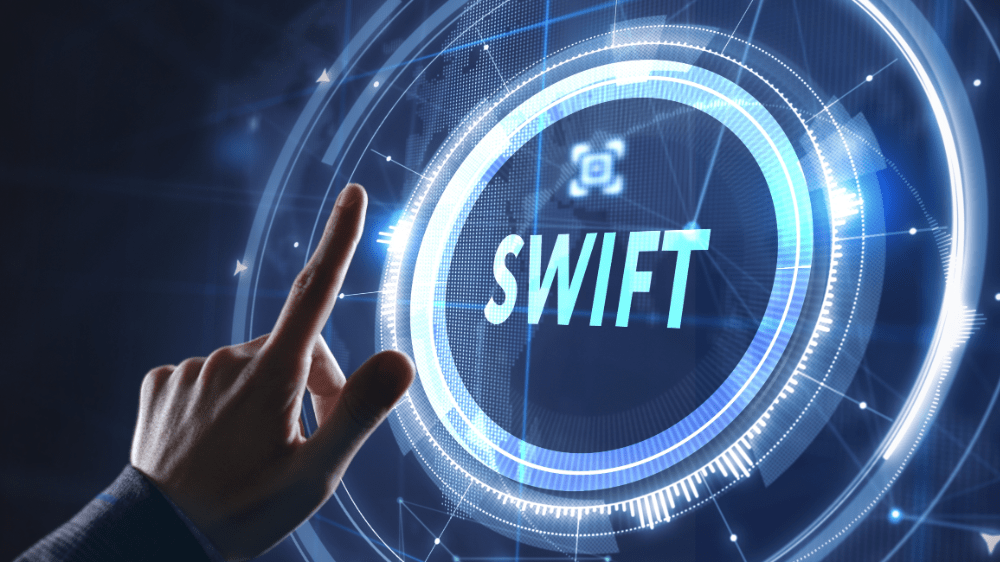 SWIFT spája silu s blockchainom