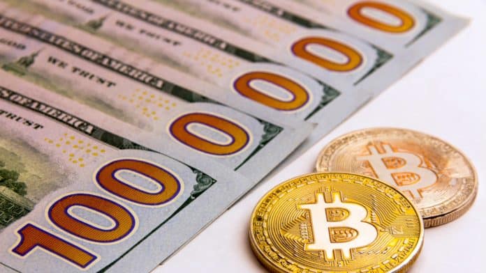 Cena Bitcoinu prý dosáhne milionu dolarů,zdroj: www.shutterstock.com/ROMSVETNIK Cena Bitcoinu prý dosáhne milionu dolarů