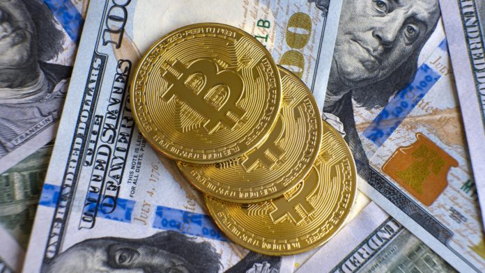 FED, dolár a ich vplyv na Bitcoin. Zdroj: Shutterstock.com/Bilanol FED, dolár a ich vplyv na Bitcoin
