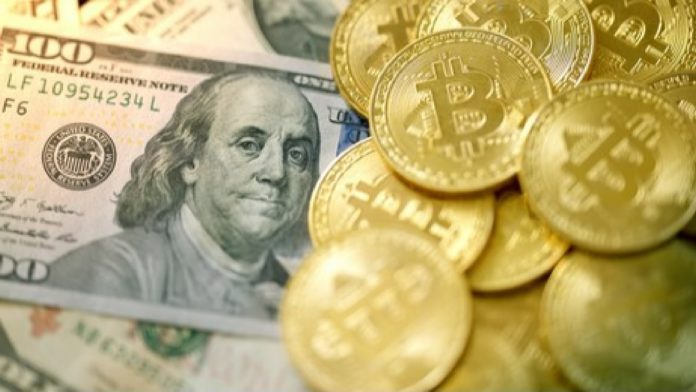 Dolárový index verzus Bitcoin. Zdroj: Shutterstock.com/aijiro Dolárový index verzus Bitcoin